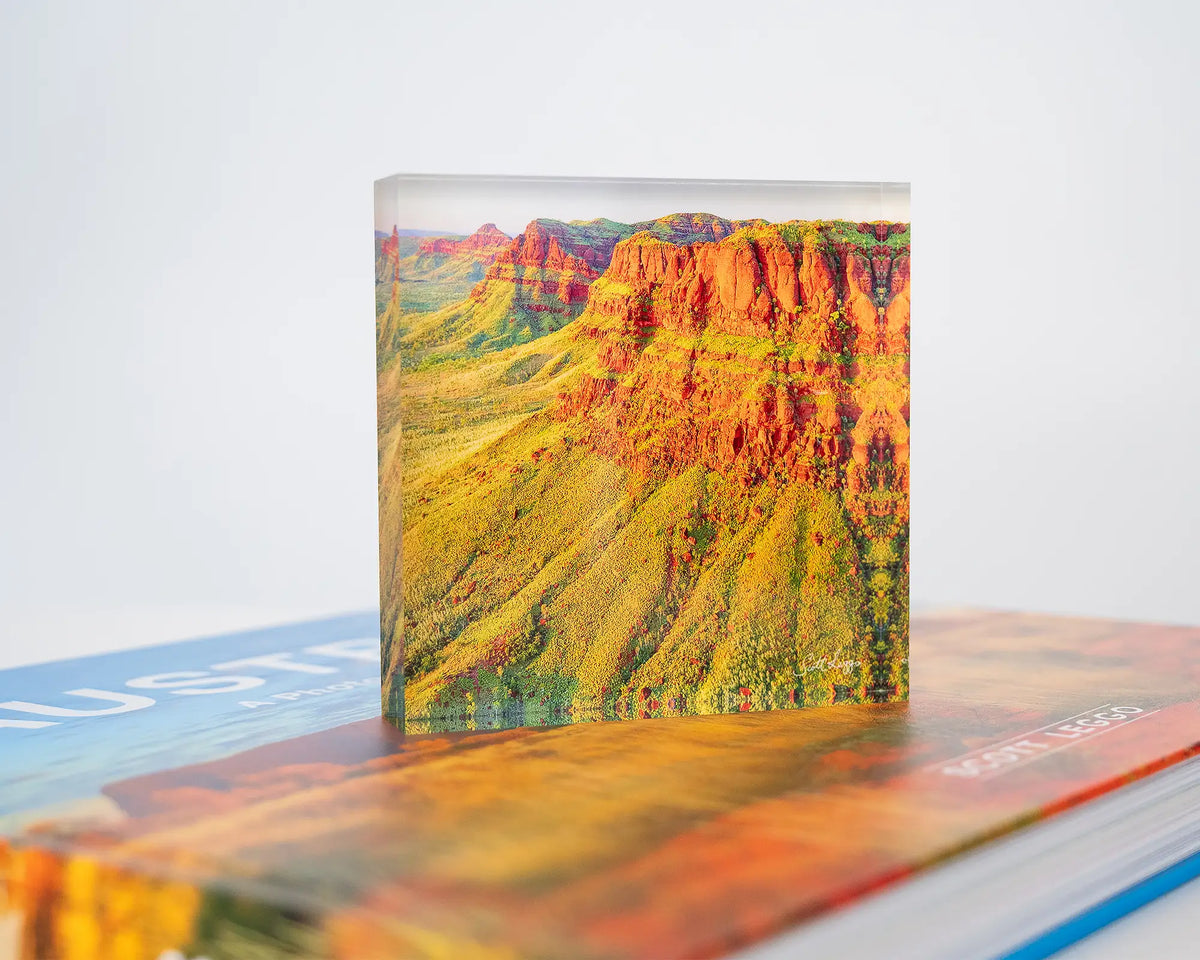Ragged Bluff. Acrylic block Ragged Range the Kimberley Western Australia, placed on a SCOTT LEGGO book.