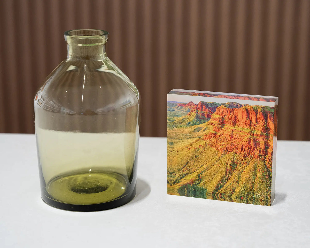 Ragged Bluff. Acrylic block Ragged Range, The Kimberley, Western Australia, styled with a small vase.