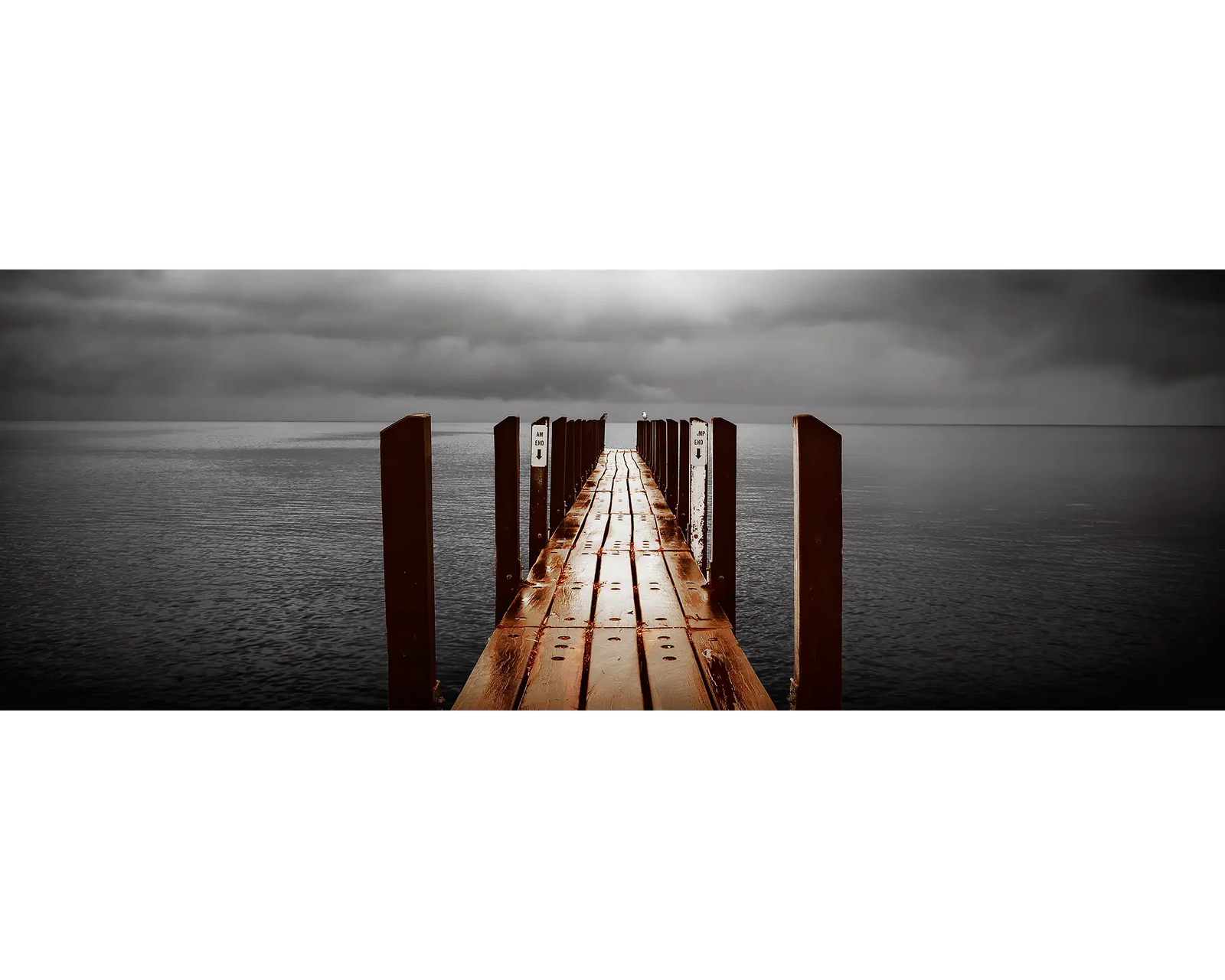 Rain clouds over the jetty at Geographe Bay, Qundalup, WA. 