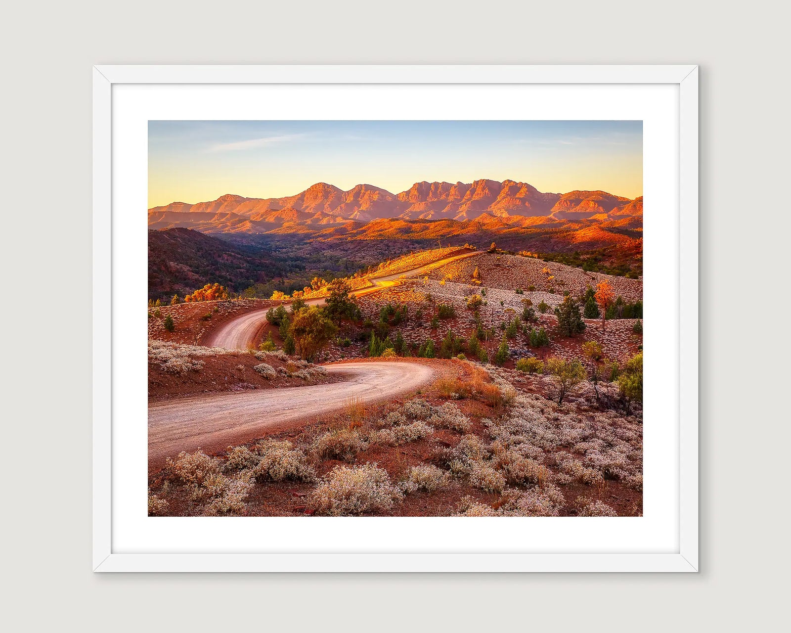 Framed landscape photograph of red rock and a dirt road at Bunyeroo Valley and Wilpena Pound.