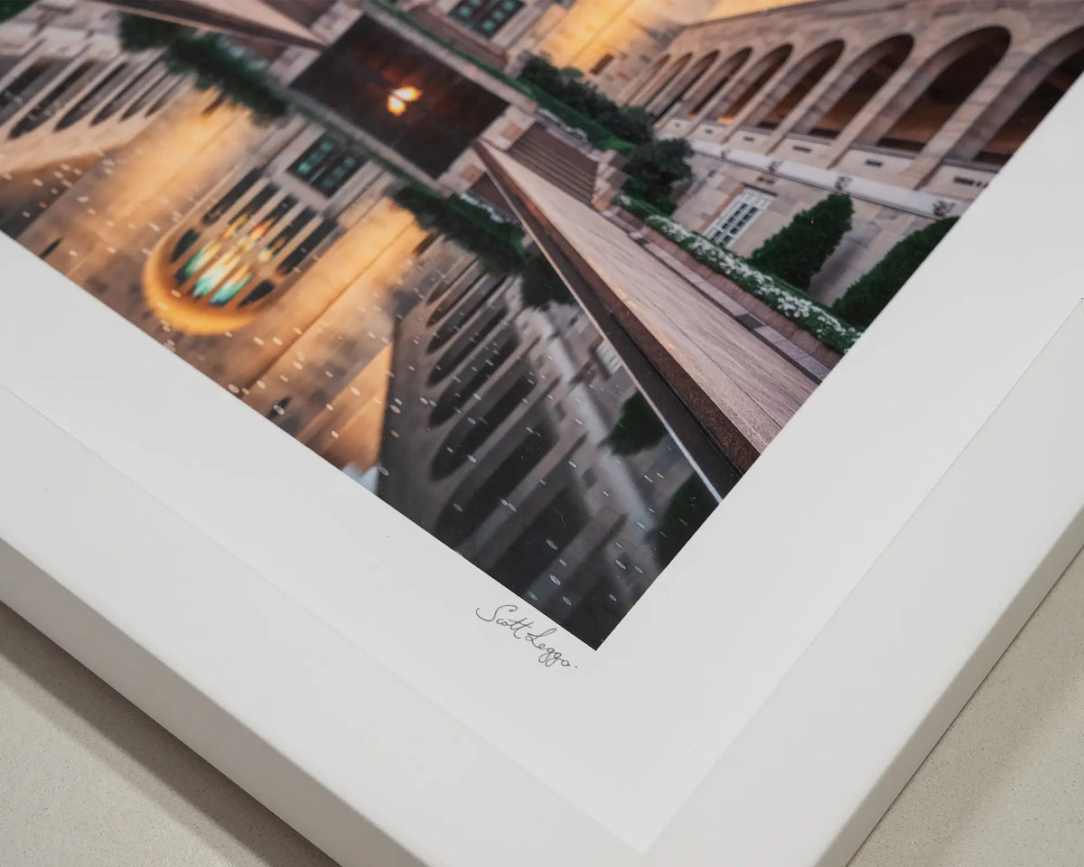 Reflection. Australian War Memorial print with white frame corner close-up details.