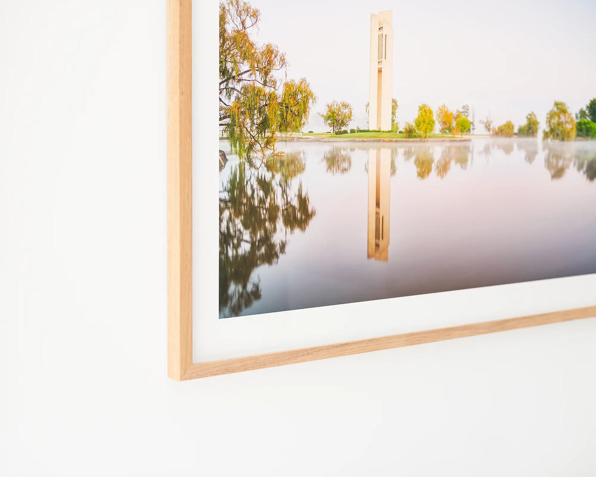 Reflective. Canberra Carillon early morning fog artwork in Tasmanian Oak frame, hanging on wall.