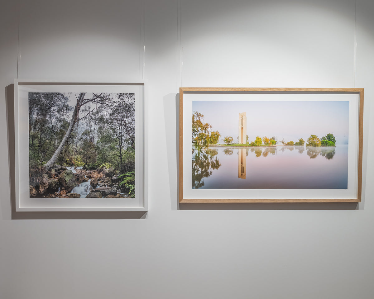 Reflective. National Carillon Canberra in early morning fog, with timber frame, hung in gallery with 'Mountain Flow' artwork.