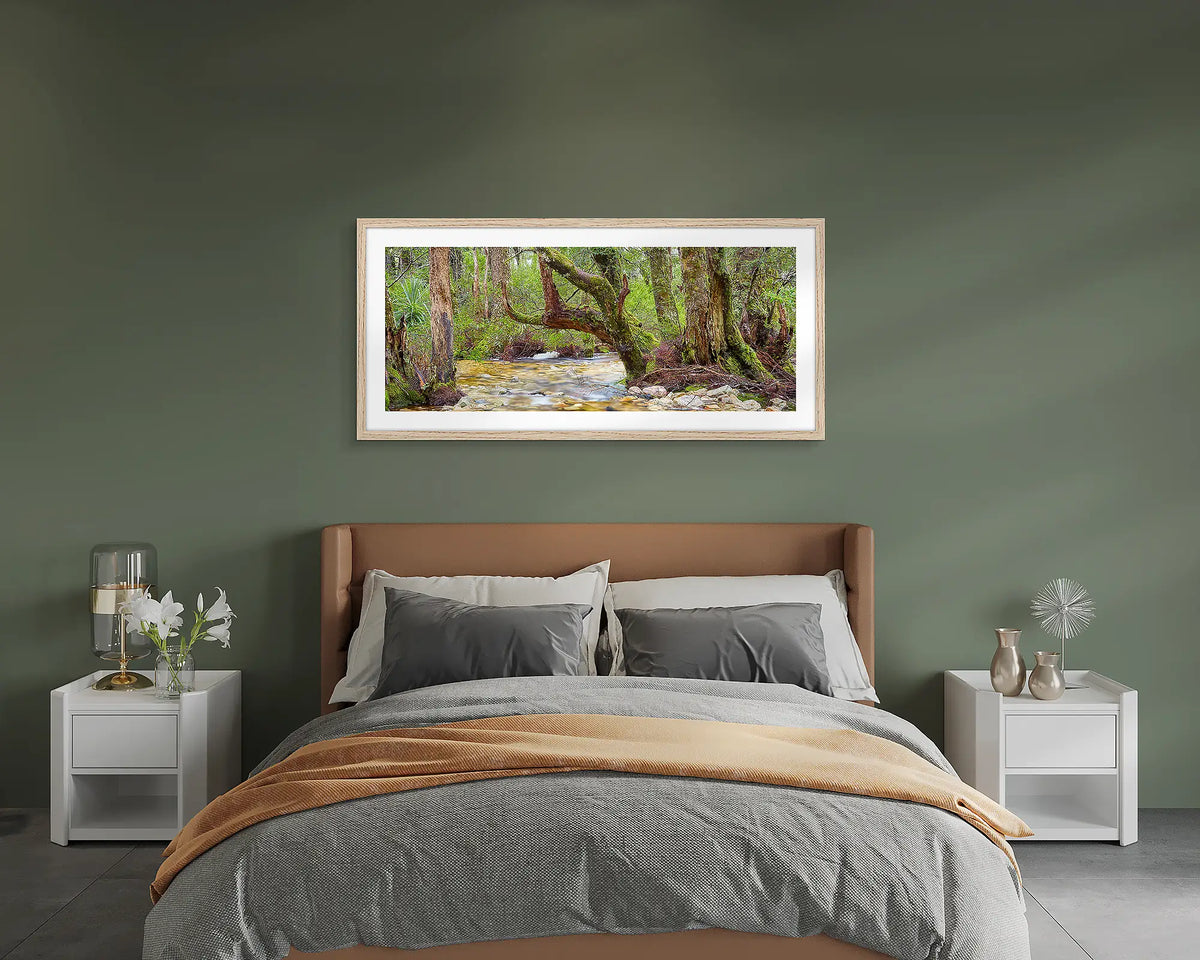 Reverie. Cradle Mountain Lake St Clair wall art print framed with a Tasmanian Oak frame, hung on a bedroom wall. 