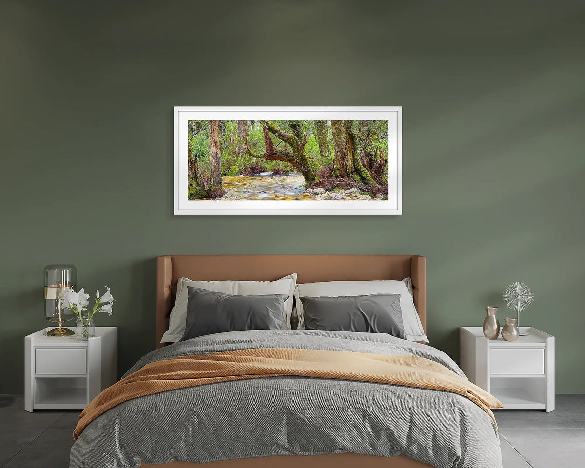 Reverie. Cradle Mountain Lake St Clair wall art print framed with a white frame, hung on a bedroom wall. 