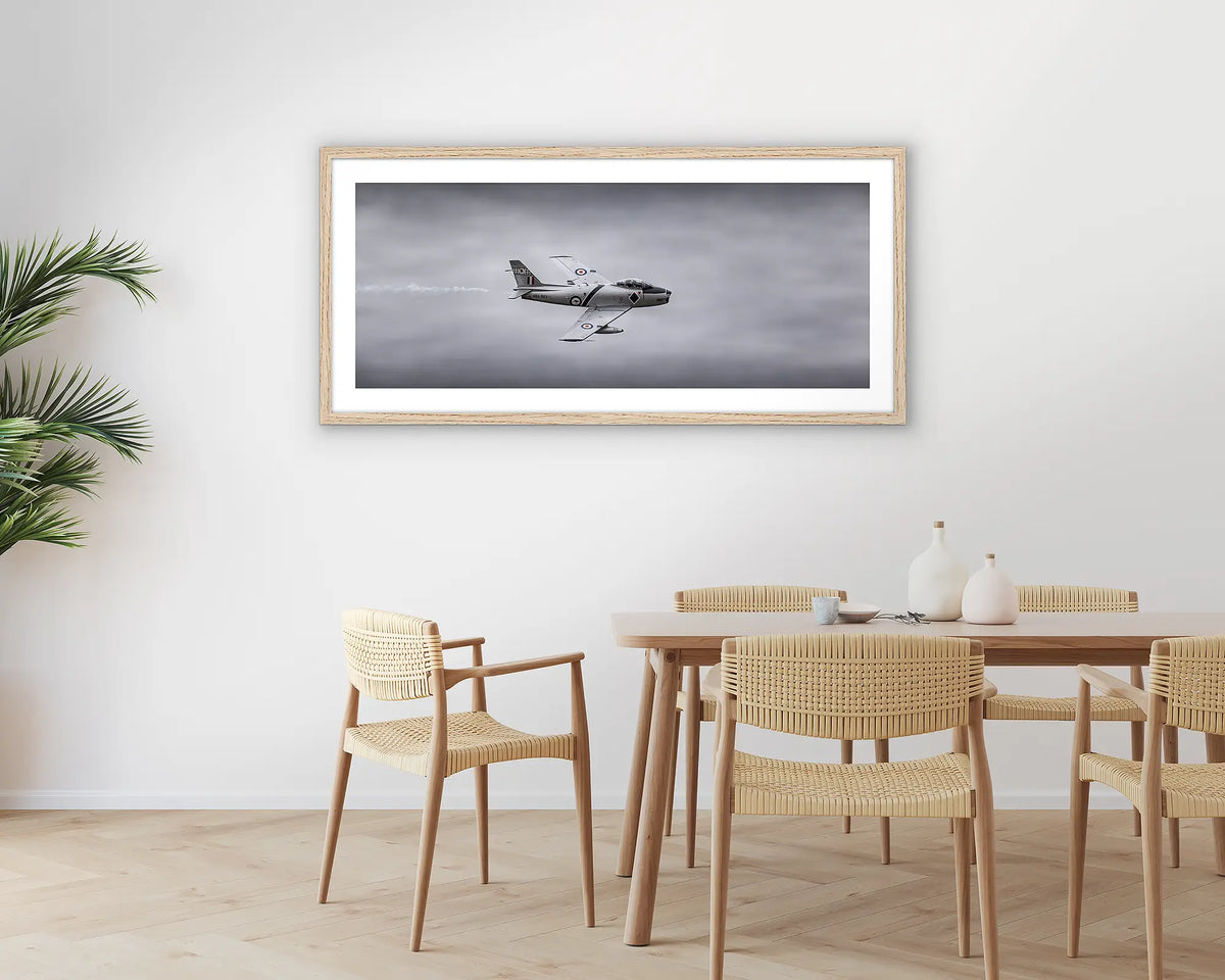 Sabre. Photographic aviation wall art print with a timber frame, hung in a dining room. 