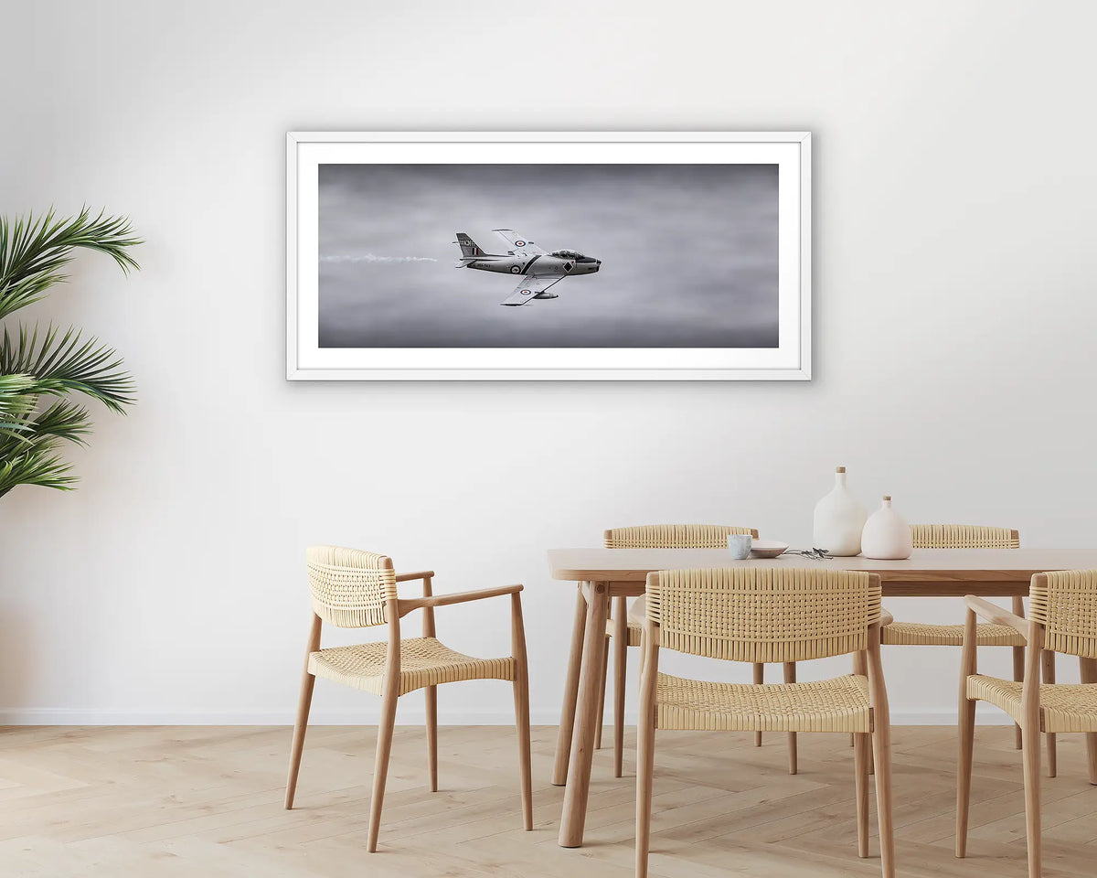 Sabre. Photographic aviation wall art print with a white frame, hung in a dining room. 