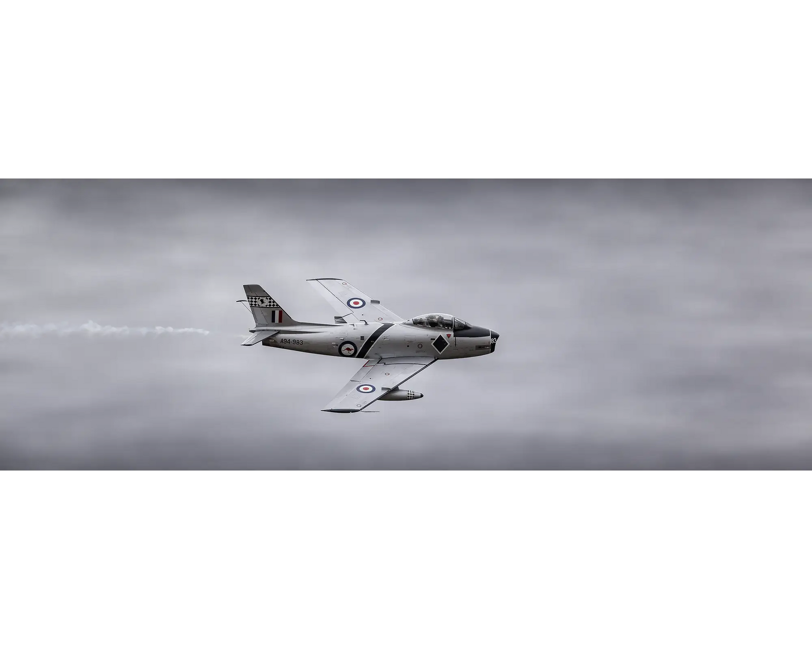 CA-27 Sabre, former Royal Australian Air Force Sabre (operated by Temora Aviation Museum) flying through cloud. 