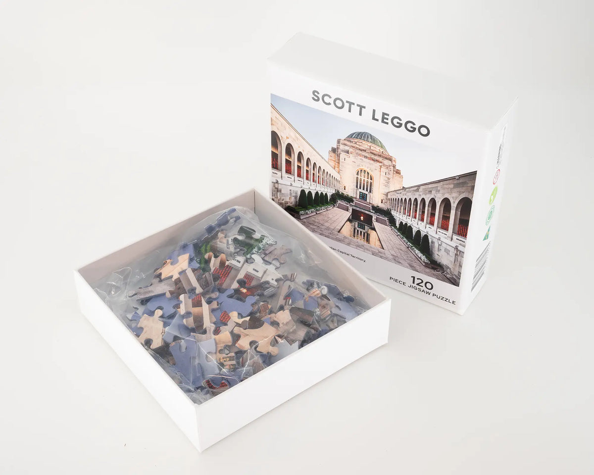 Sacrifice 120 piece jigsaw puzzle box lid open with puzzle pieces inside.