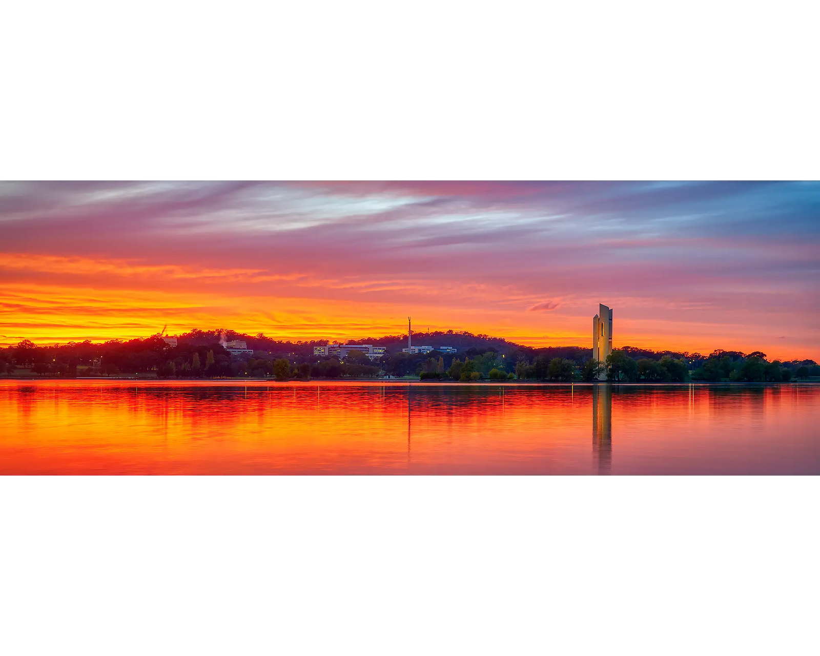Scarlet sunrise over Russell Office and Lake Burley Griffin, Canberra.
