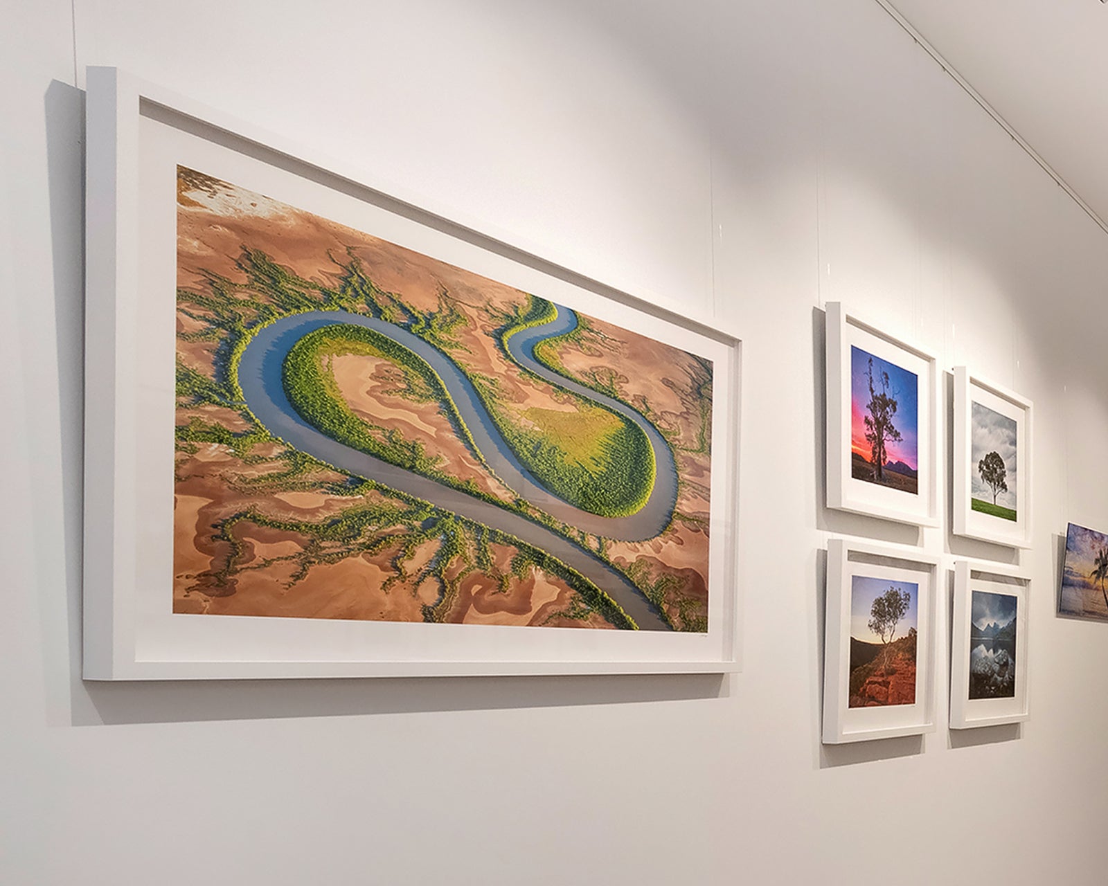 Framed landscape photograph of the King River winding through an arid landscape with greenery.