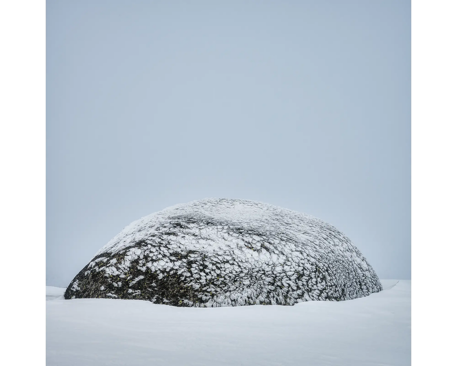 Snow Dome. Rock covered in ice at Ram's Head Range, Kosciuszko National Park. 