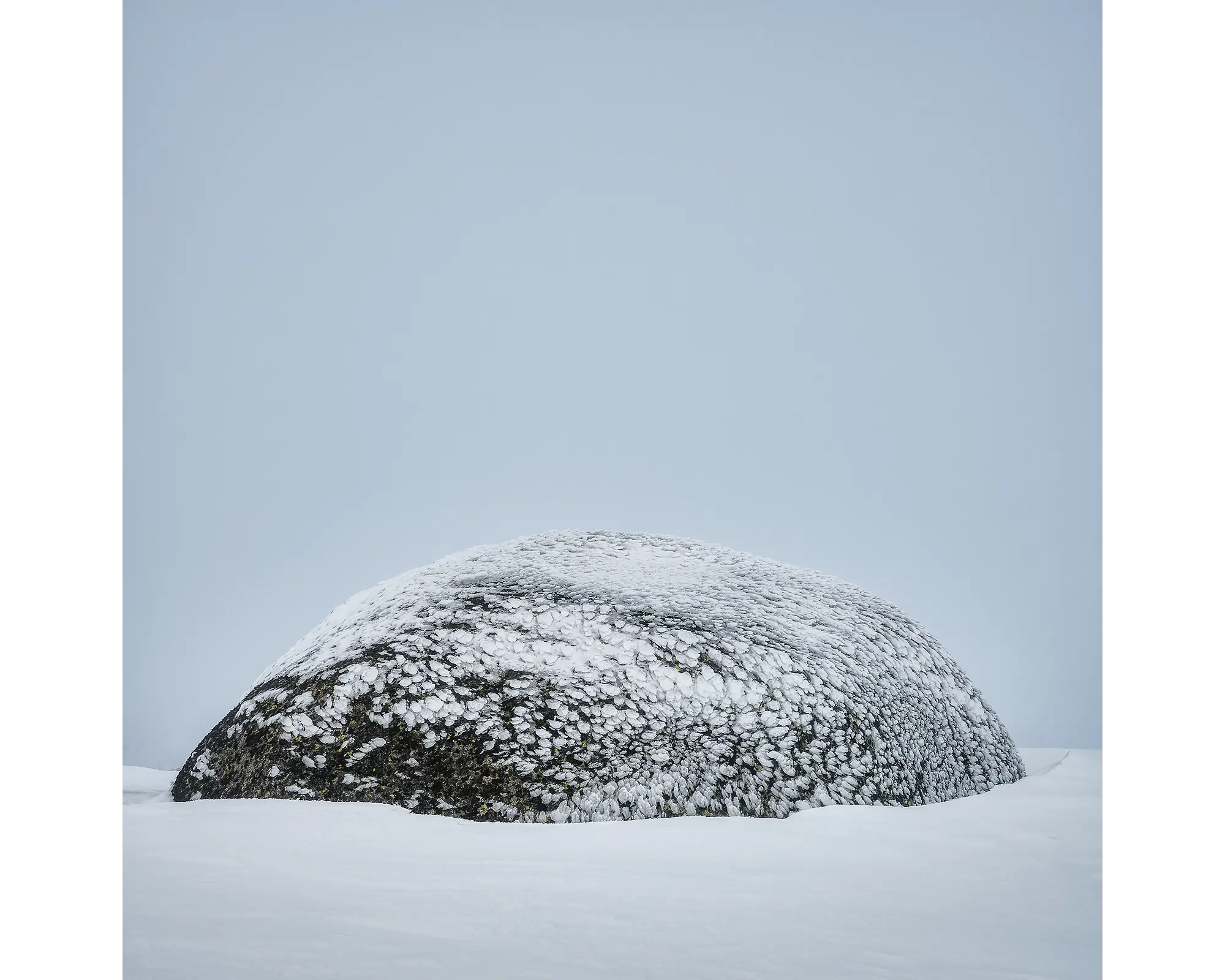 Snow Dome. Rock covered in ice at Ram's Head Range, Kosciuszko National Park. 