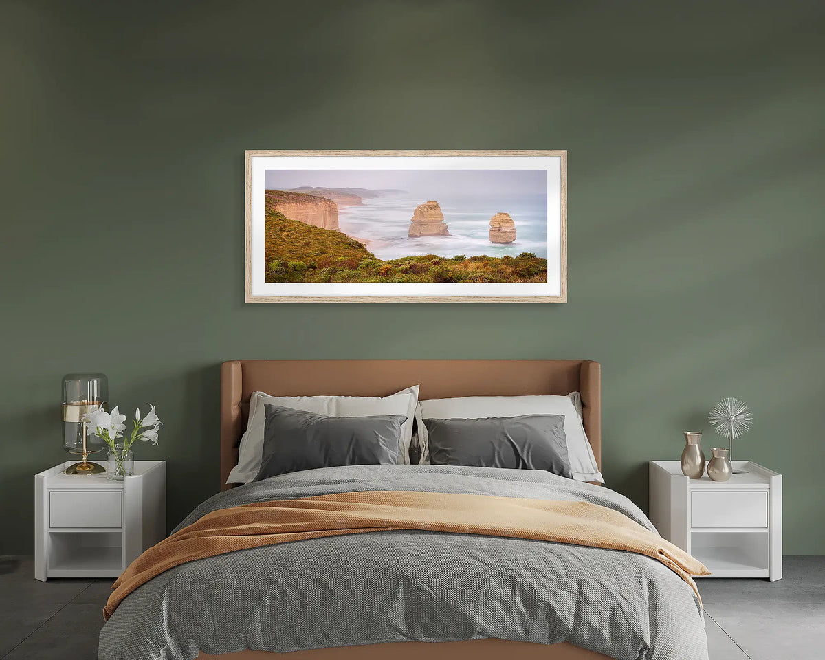 Southern Ocean Sentinels. Gog and Magog, Great Ocean Road wall art print, framed with a Tasmanian Oak frame and hung on a bedroom wall.