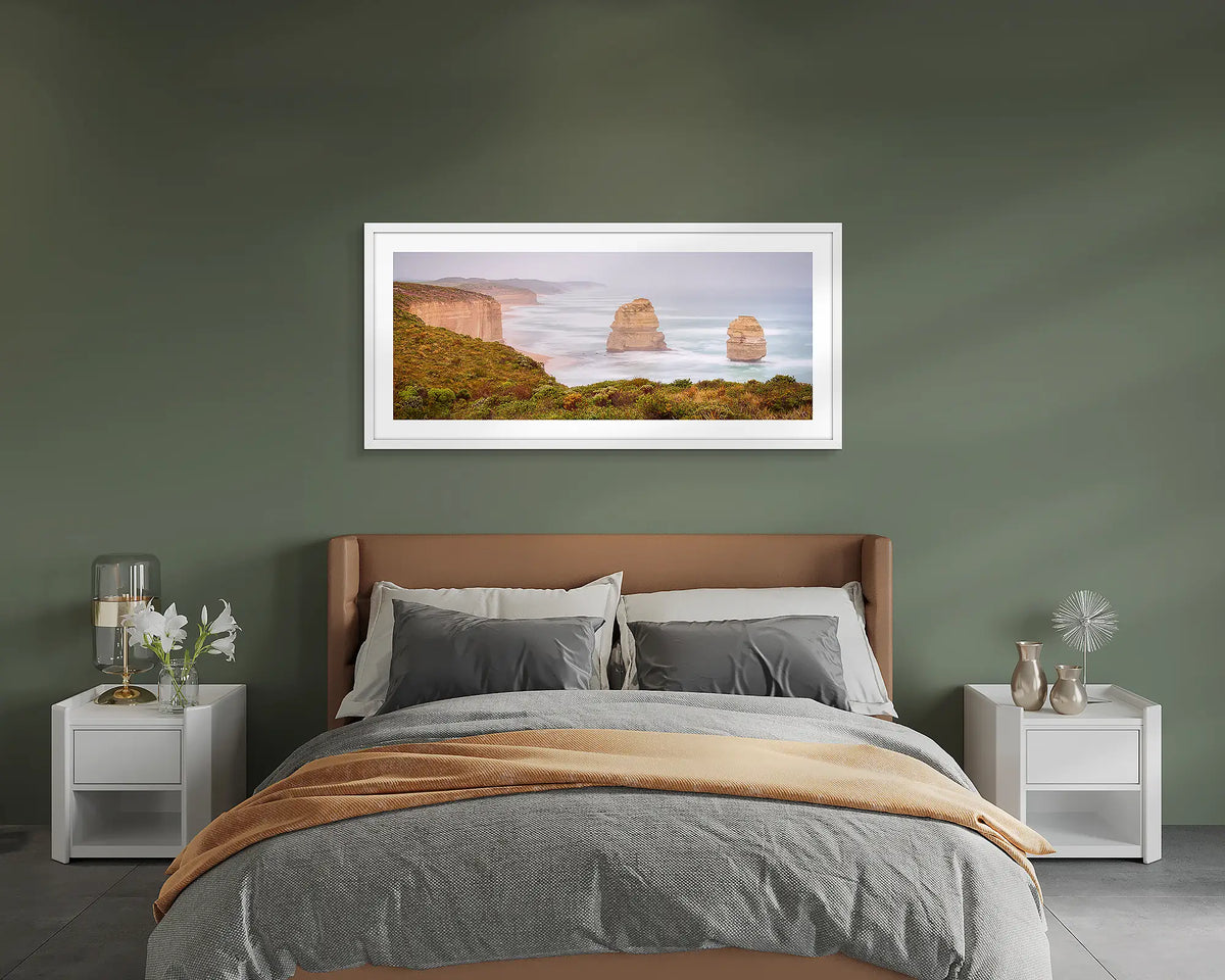 Southern Ocean Sentinels. Gog and Magog, Great Ocean Road wall art print, framed with a white frame and hung on a bedroom wall. 