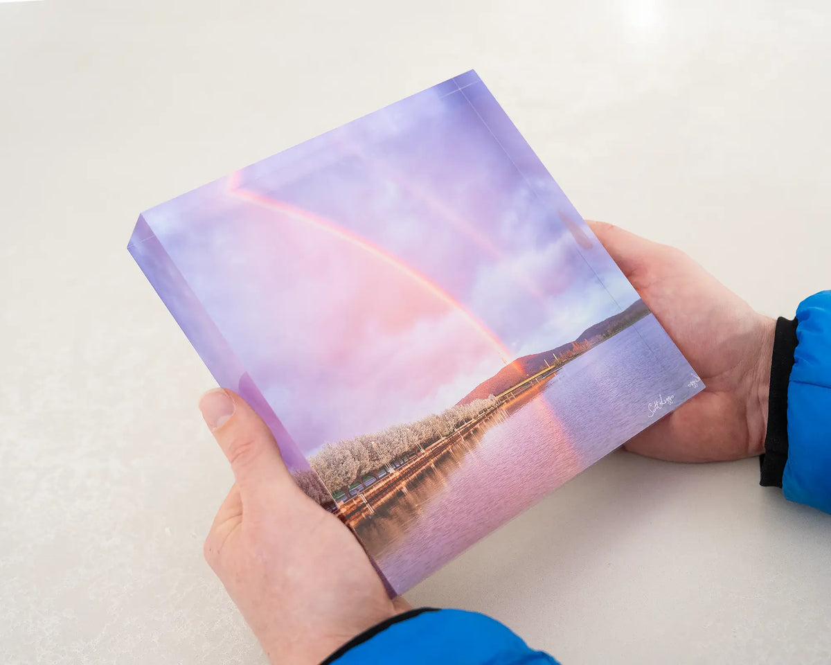 Spring Delight. Acrylic block of a double rainbow over Lake Burley Griffin, Canberra, being hand held.
