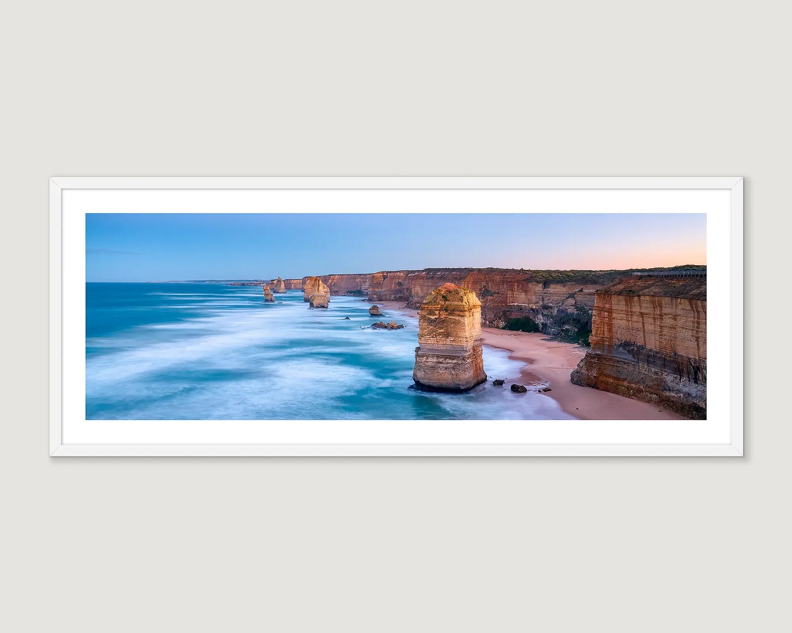 Framed panoramic view of a coastal landscape with cliffs and ocean on the Great Ocean Road.