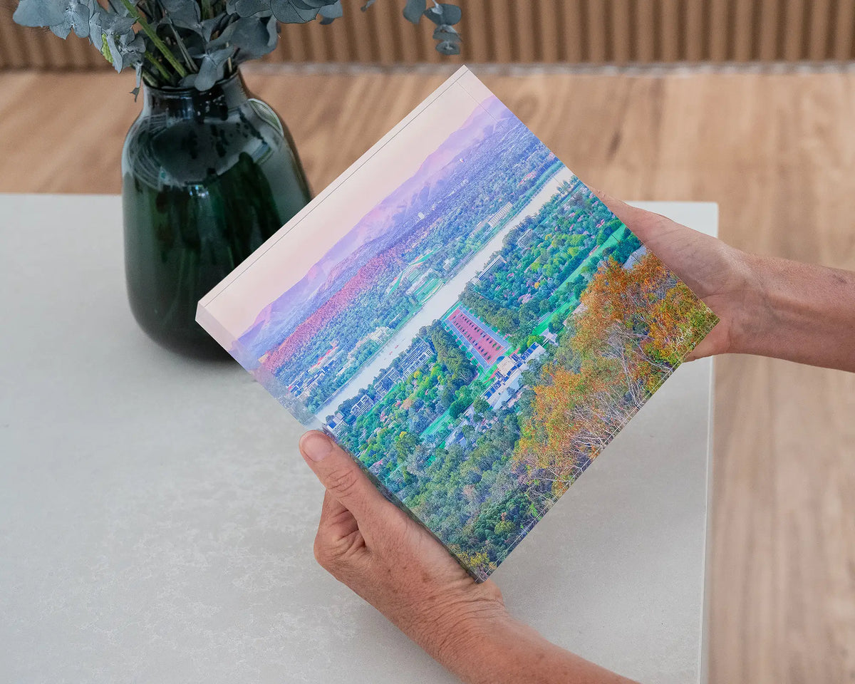 State Of Flux. Acrylic block of a Canberra sunrise from Mount Ainslie, hand held in gallery.