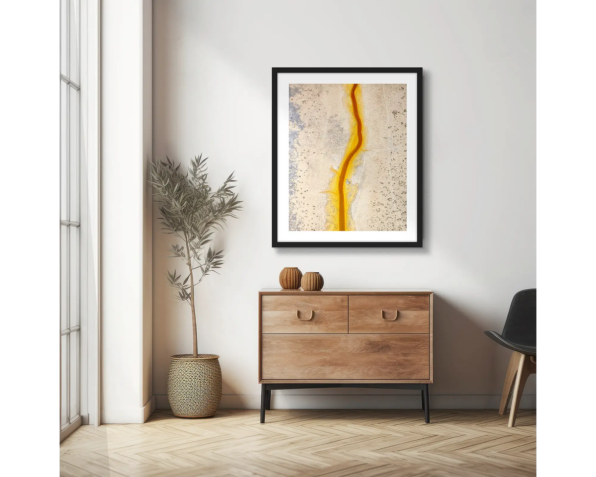 Strike. Abstract photographic wall art print with a black frame, hung in a scandi hallway. 