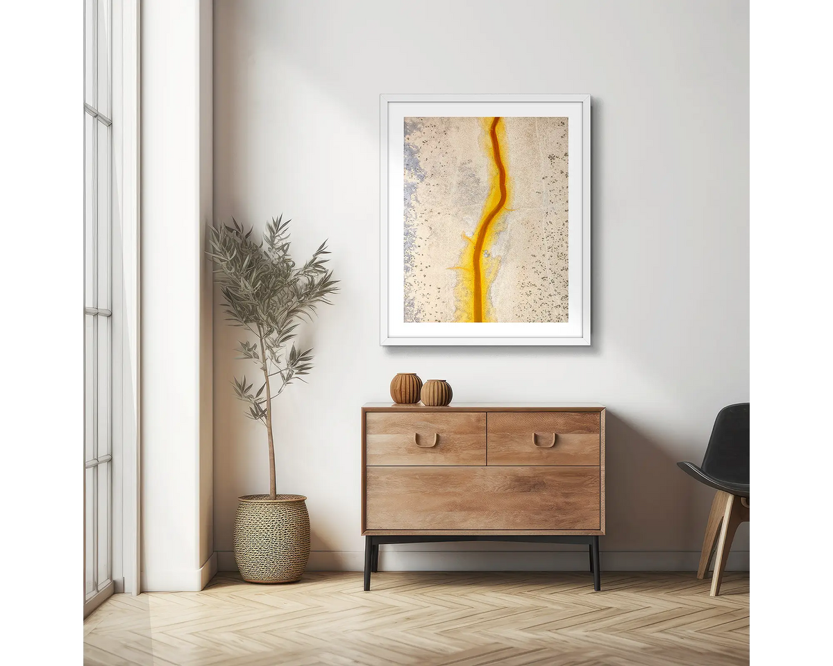 Strike. Abstract photographic wall art print with a white frame, hung in a scandi hallway. 