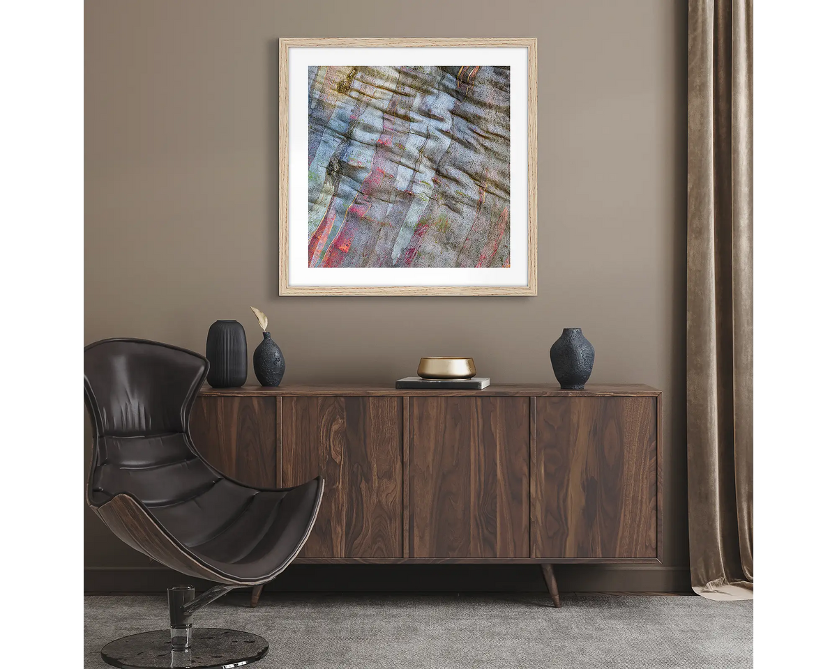 Stirling Colours. Abstract wall art print of snow gum bark on Mount Stirling, framed with a timber frame and hung in a lounge room.