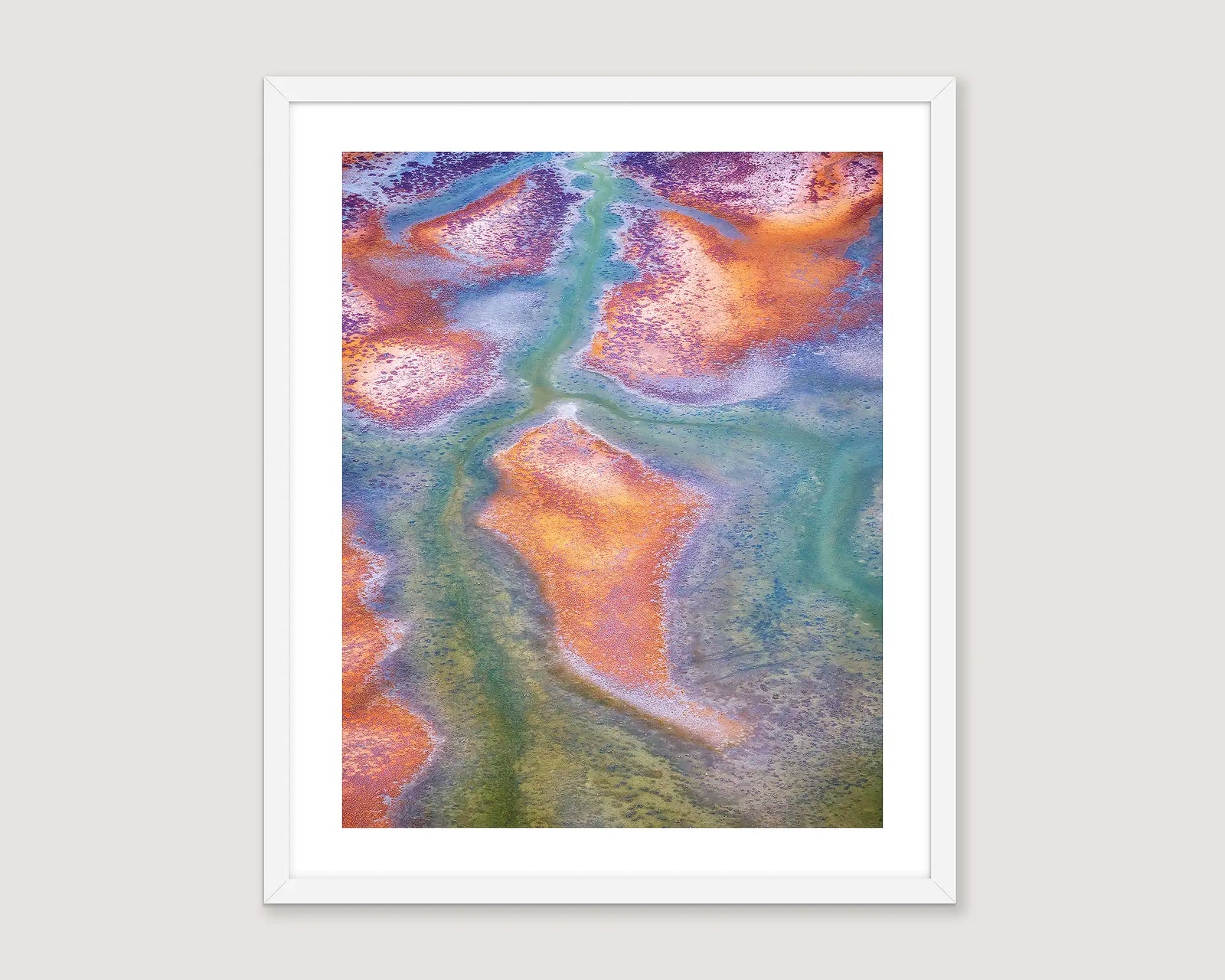 Framed abstract art print with colourful patterns on a white background.