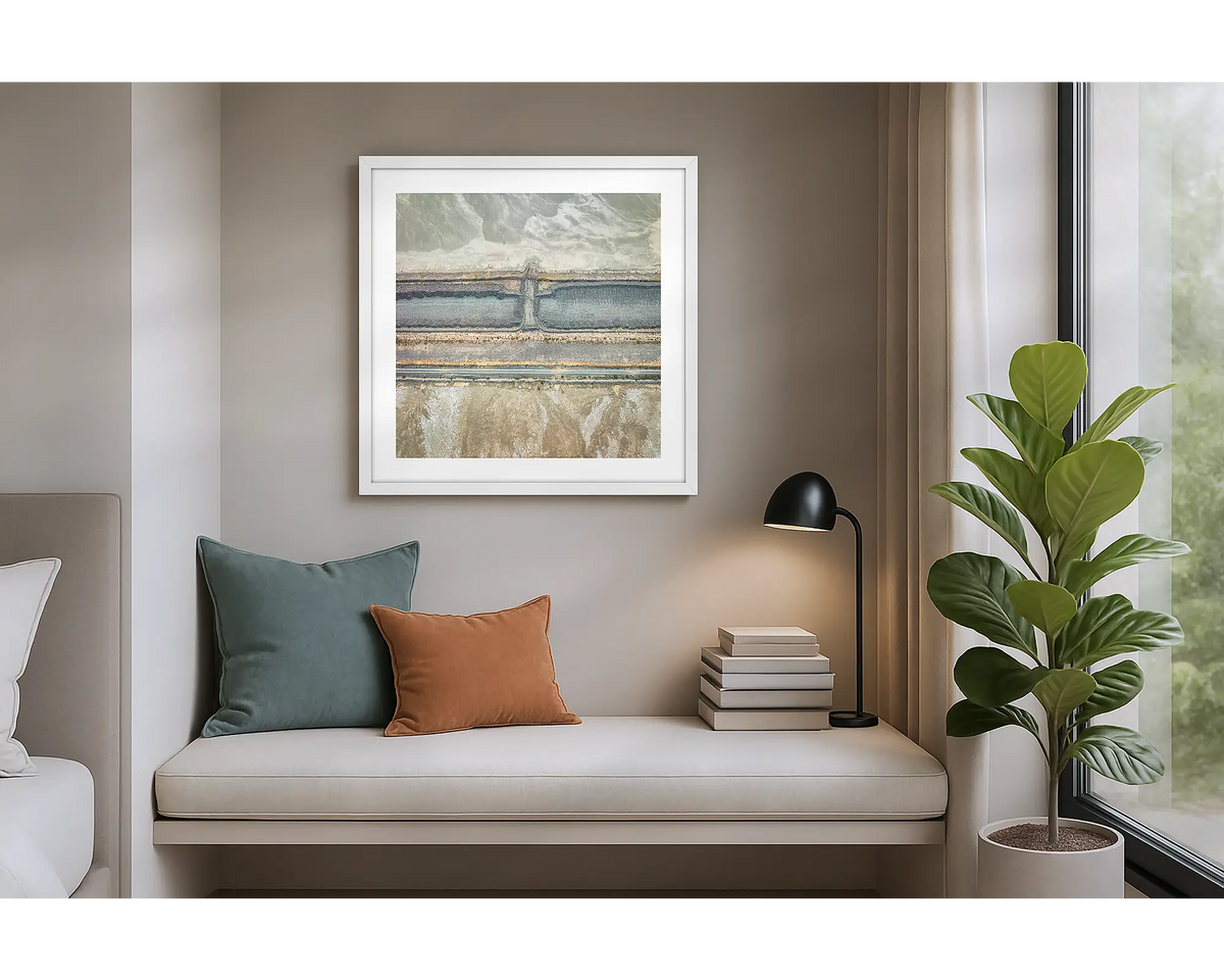 Surplus. Wall art print of an abstract scene, of a mine site from above, with a white frame, hung in an apartment. 