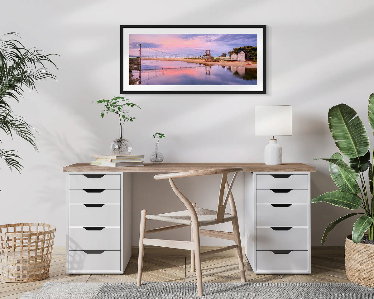 Swing Bridge. Lorne wall art print, with a black frame, hung above a small office desk.