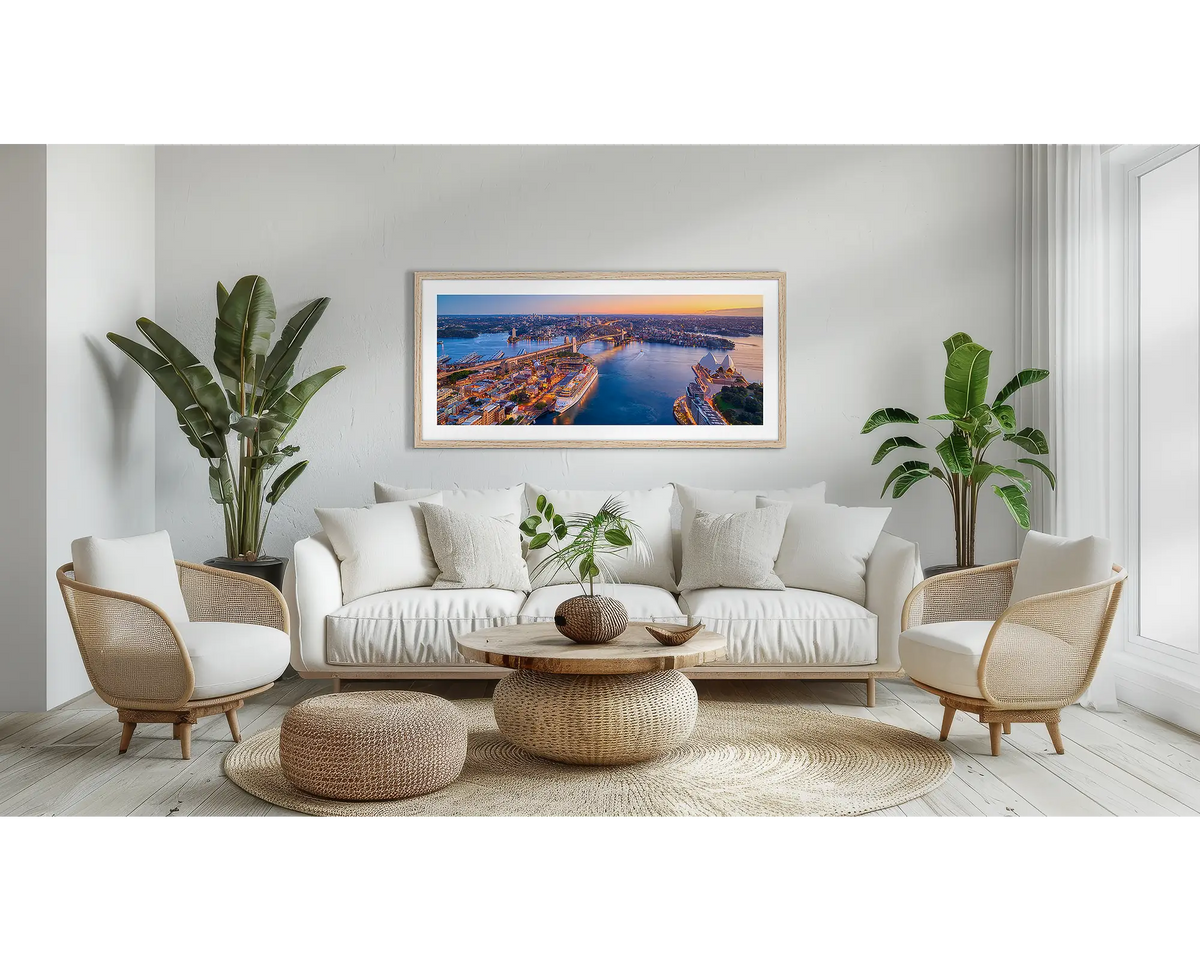 Sydney Awakes. Sydney Harbour wall art in a Tasmanian Oak frame, in a lounge room.