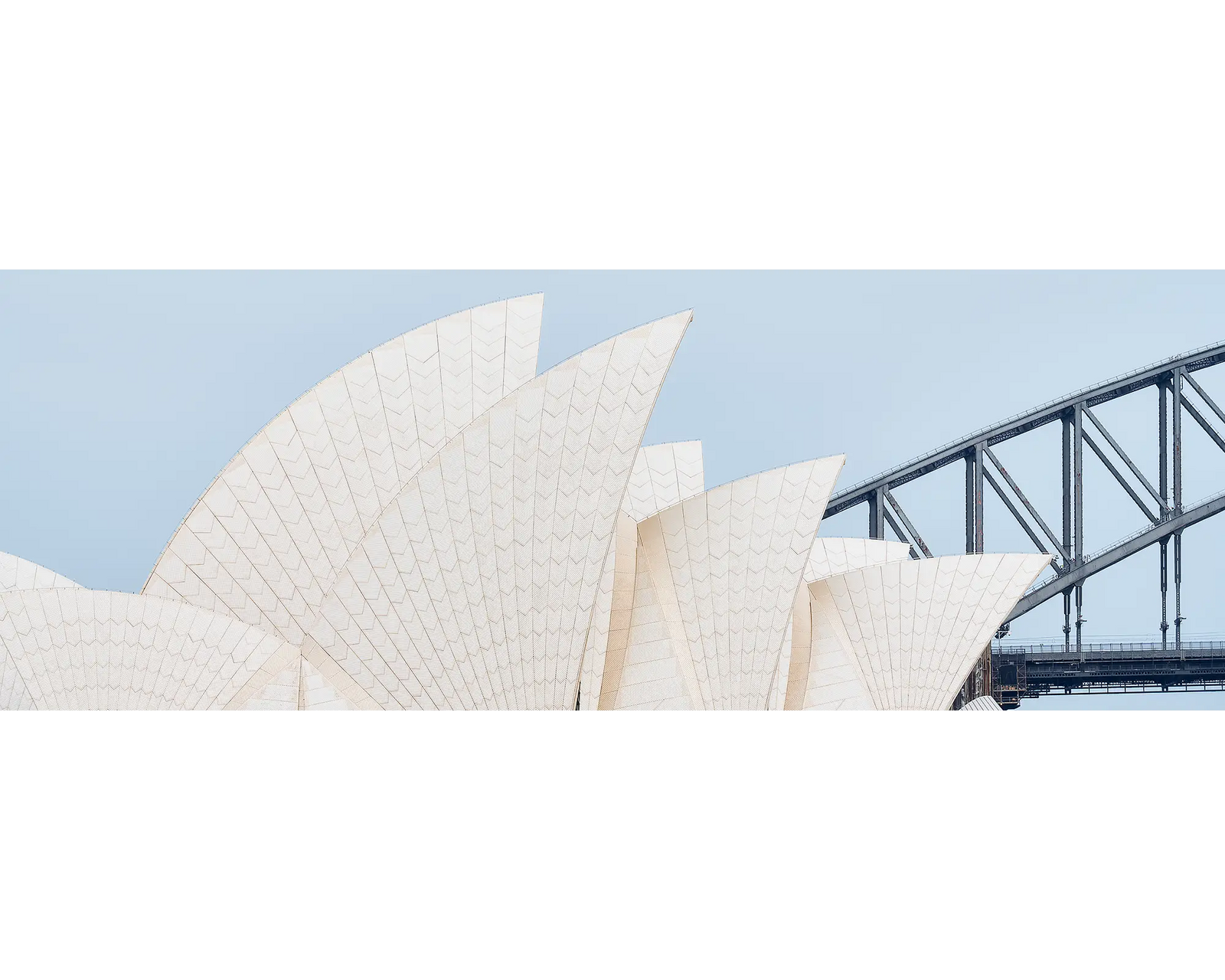 Sydney Outlines. Sydney Opera House Sales and Sydney Harbour Bridge in background.