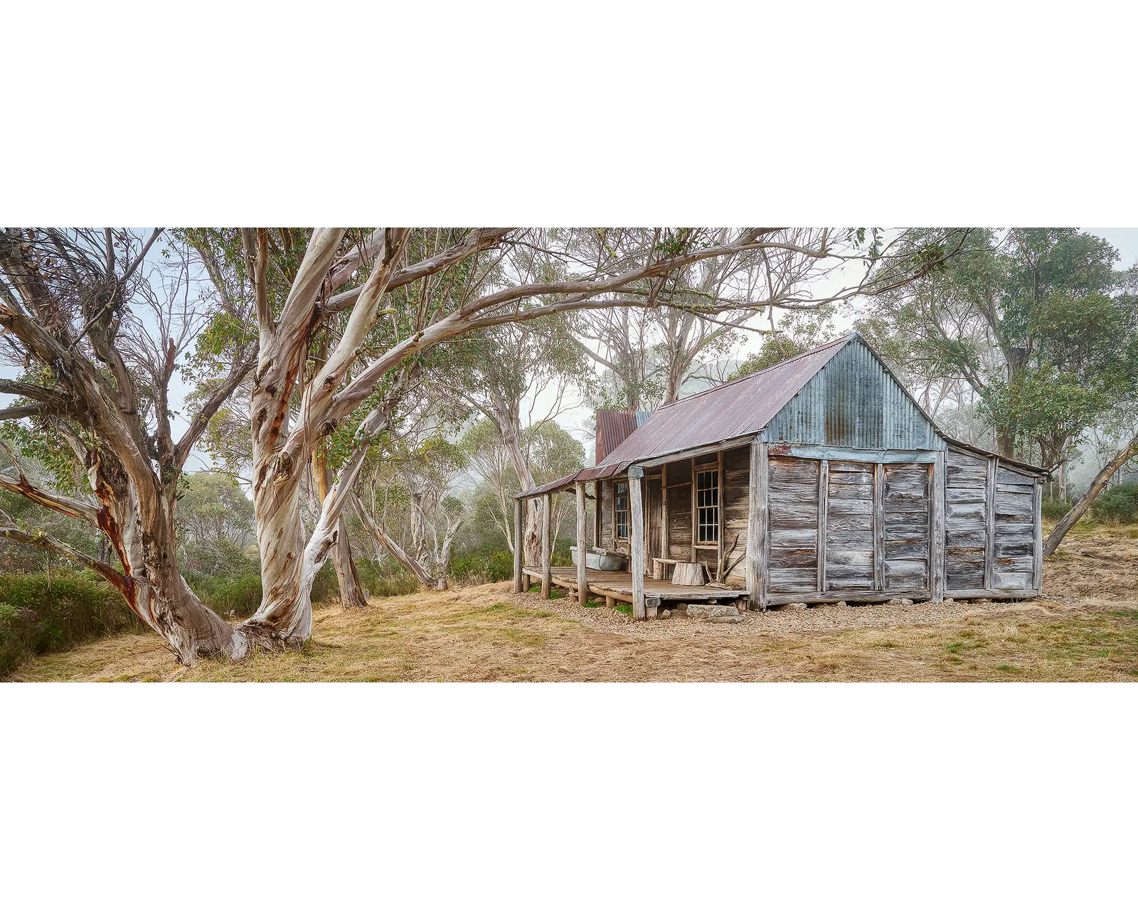 Tales of the Stockman. Wheelers Hut with fog, Kosciuszko National Park.