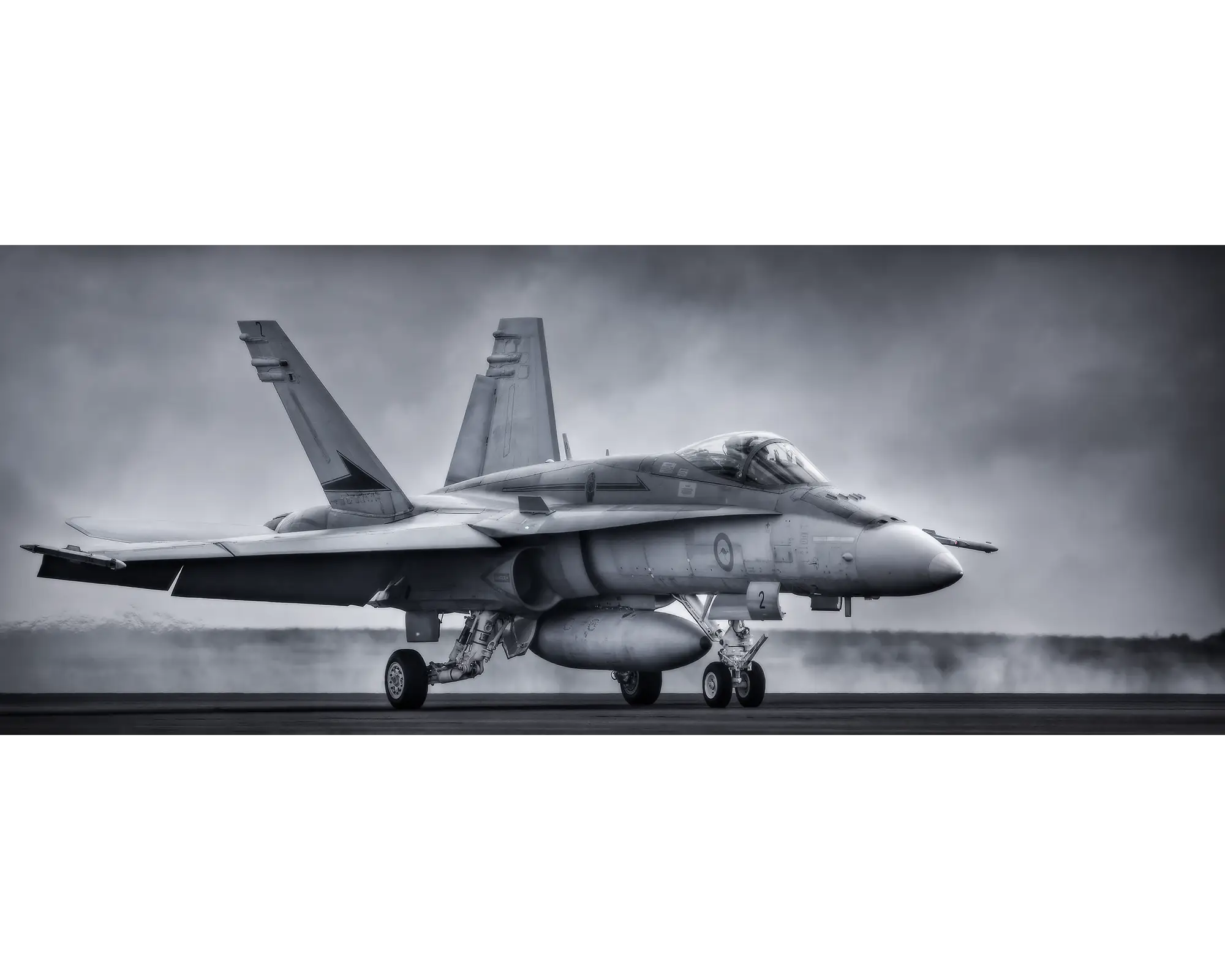 Taxiing Home - Royal Australian Air Force F/A-18 taxiing with smoke in the background.