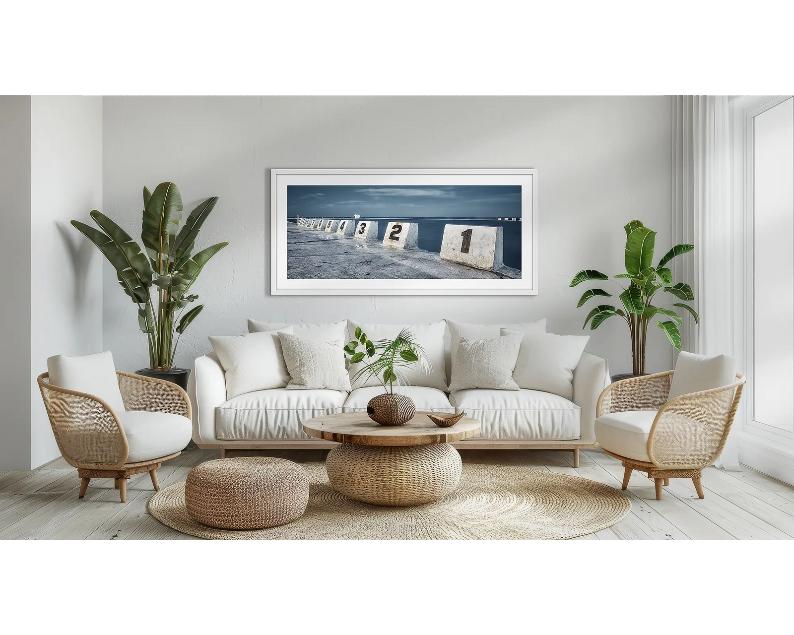 Framed photograph of numbered concrete blocks by a body of water at Merewether Ocean Baths.