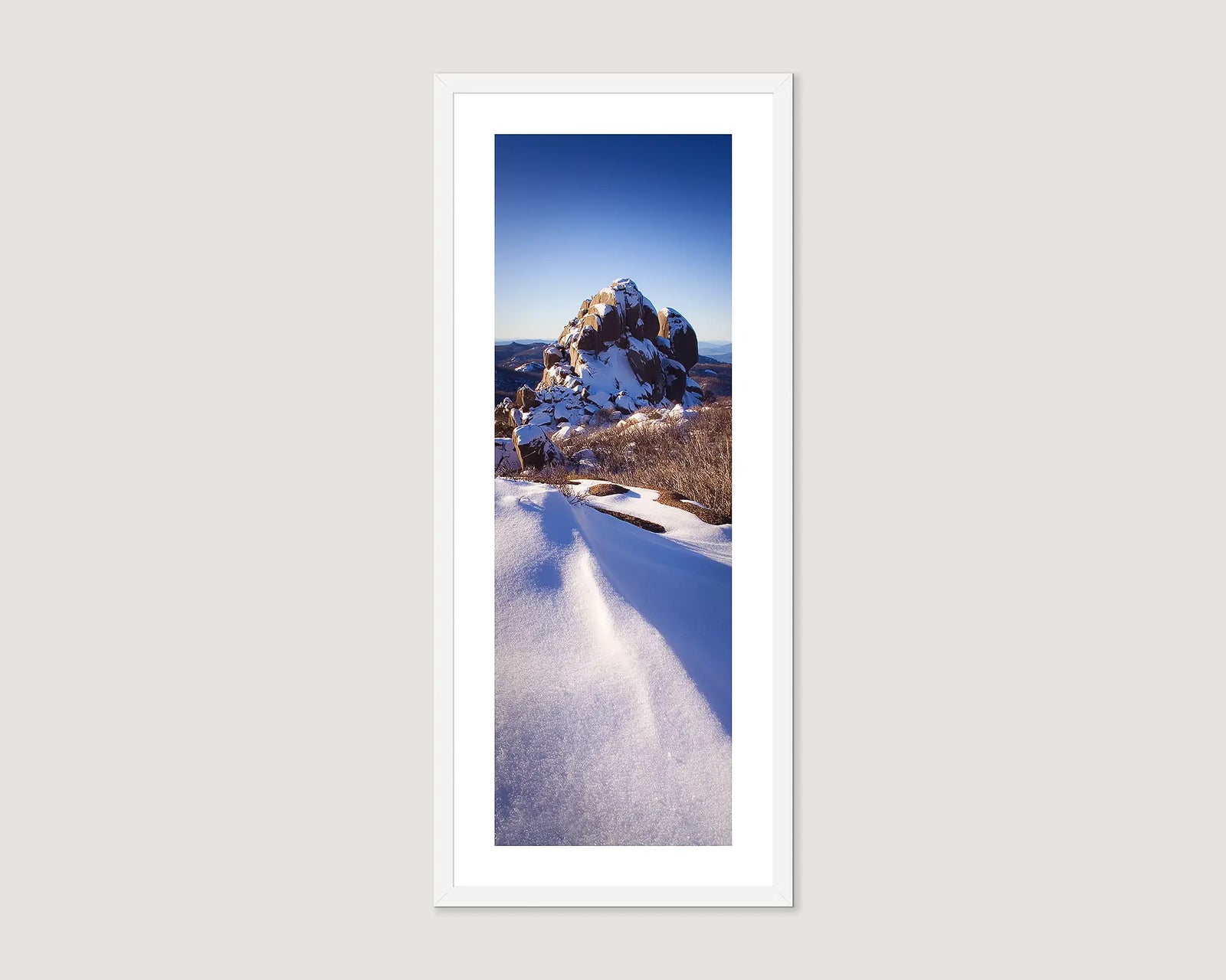 Framed photograph of a snowy landscape around the Cathedral on Mount Buffalo.