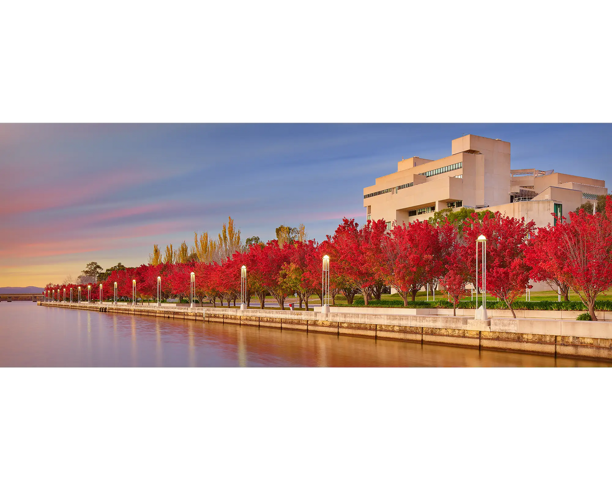 The High Court - autumn sunrise with red trees, Canberra.