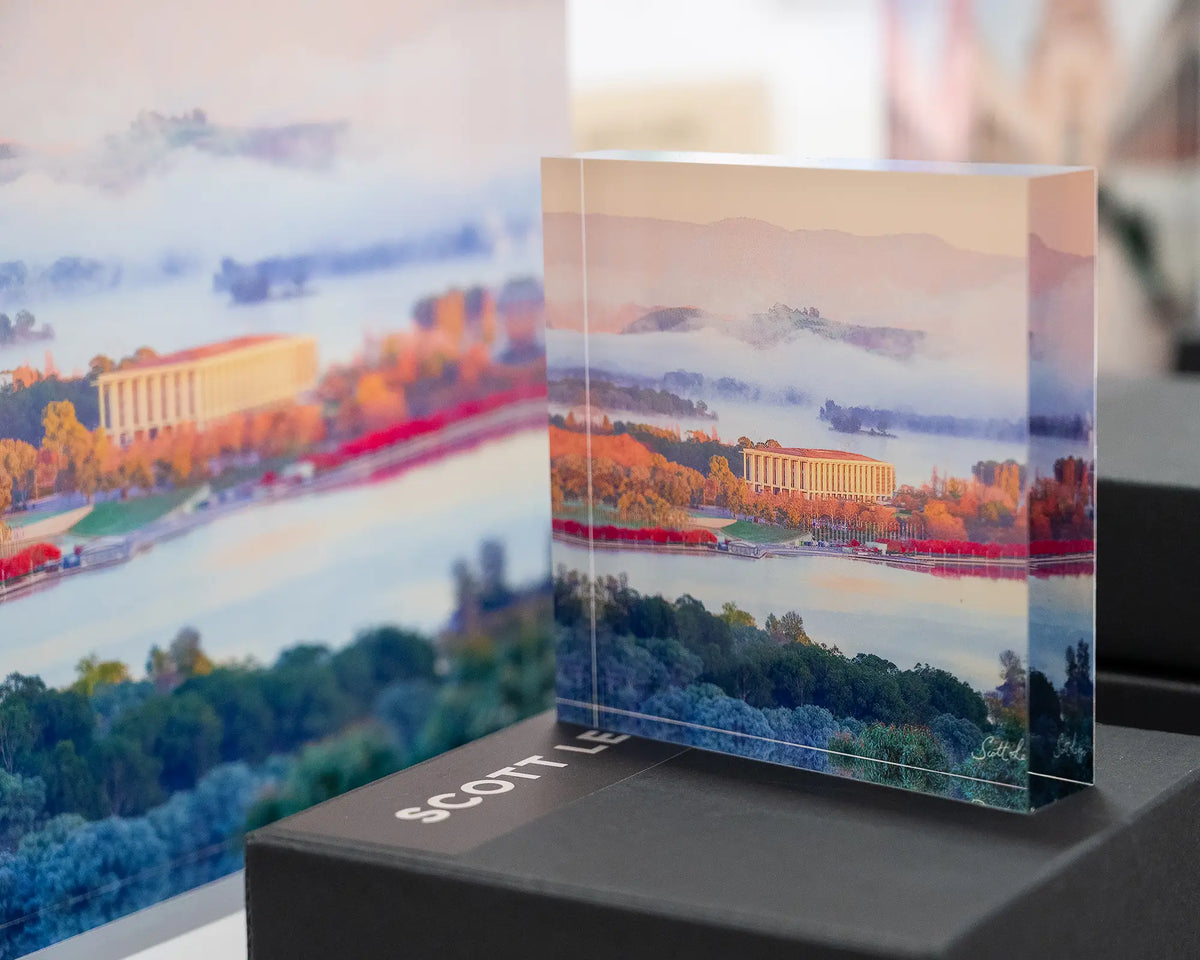 The Library. Acrylic block National Library of Australia, on display in gallery placed on gift box with 19cm block behind.