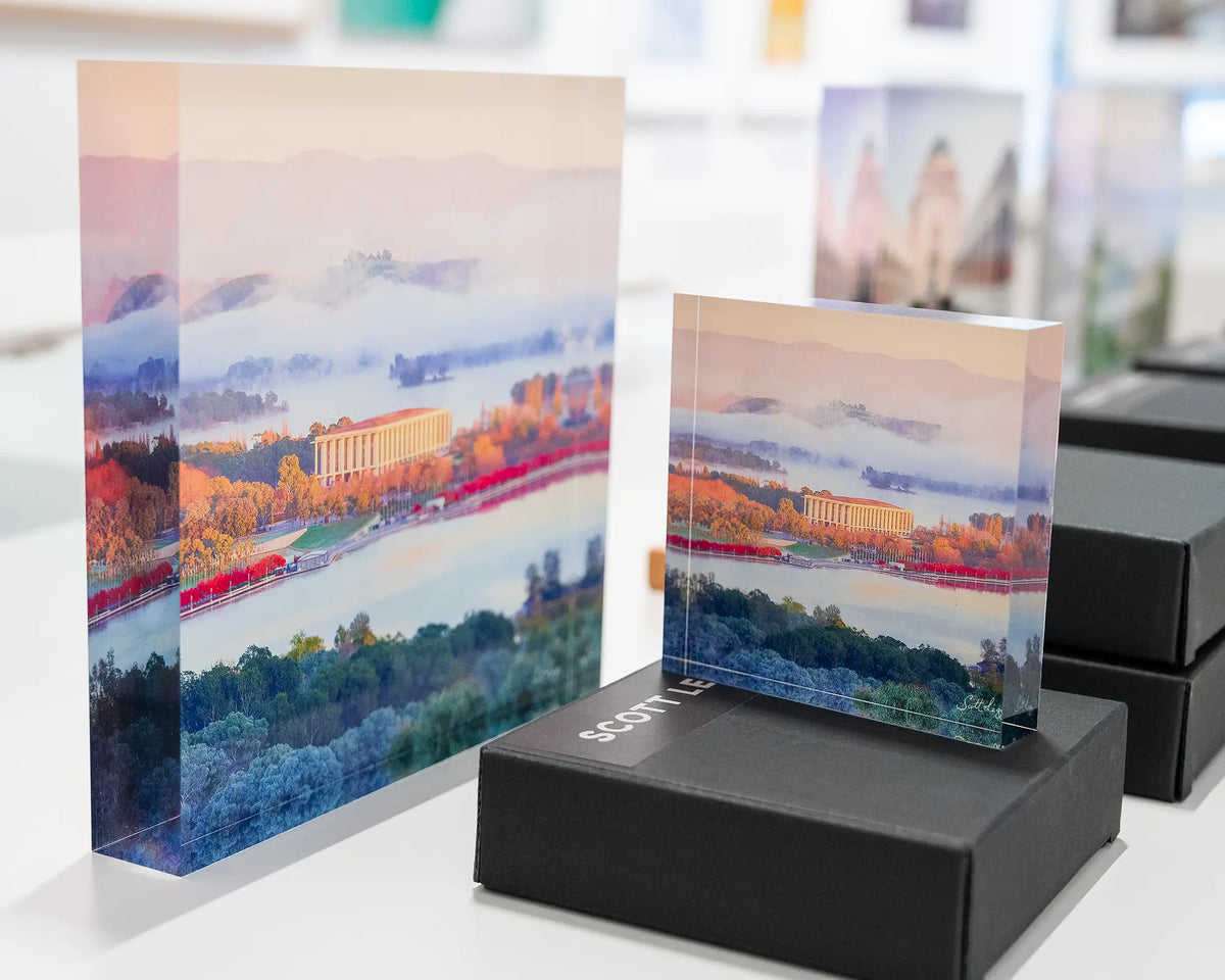The Library. National Library of Australia 10cm acrylic block on gift box, displayed in gallery with 19cm block beside.