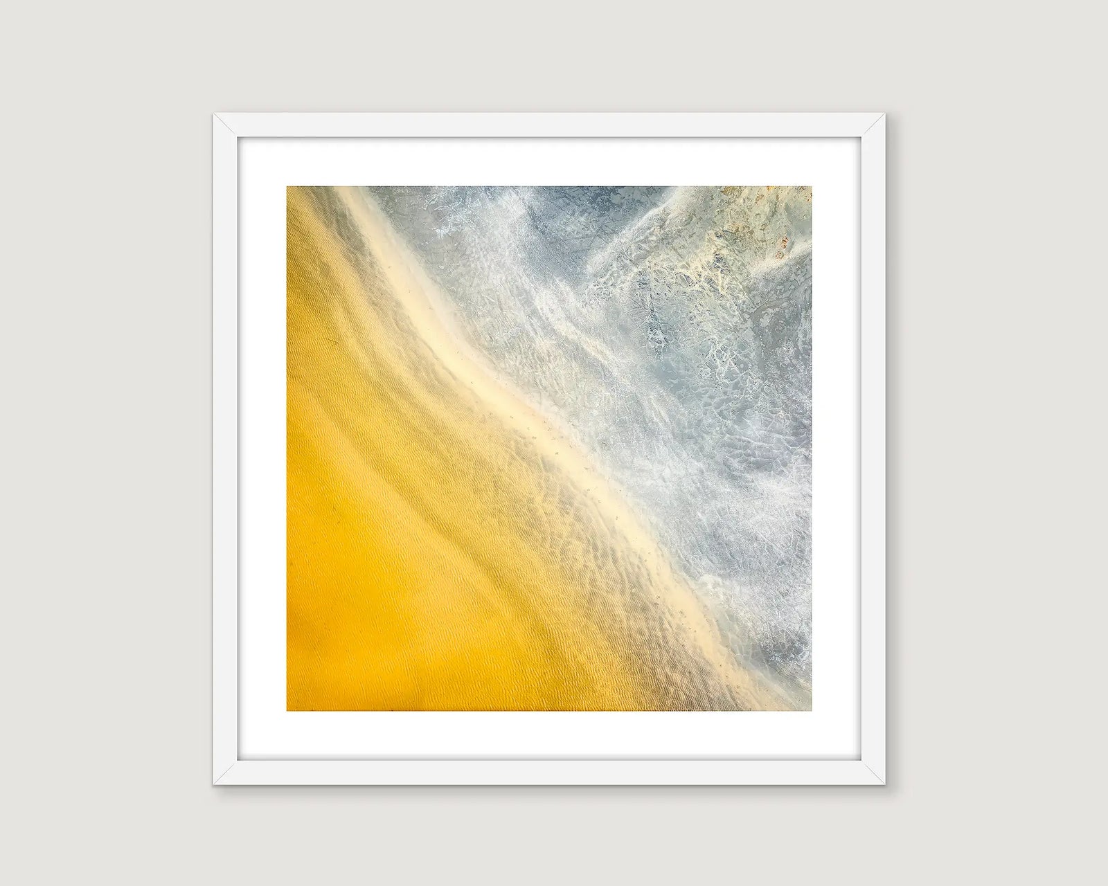 Framed abstract art with yellow and blue grey gradient on a light grey background.