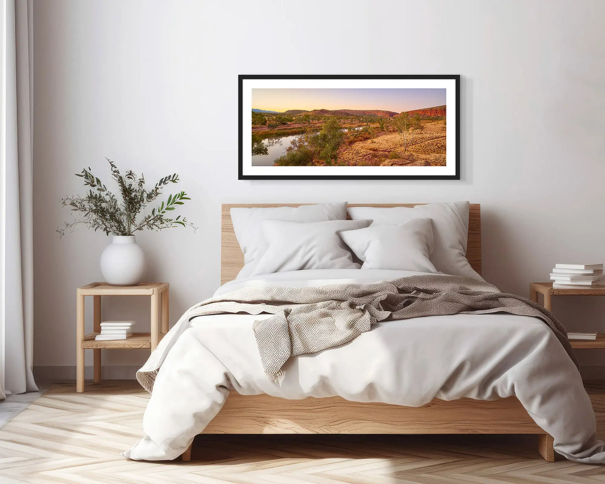 The Long Continuum. Black framed, outback wall art print, in a scandi-themed bedroom.