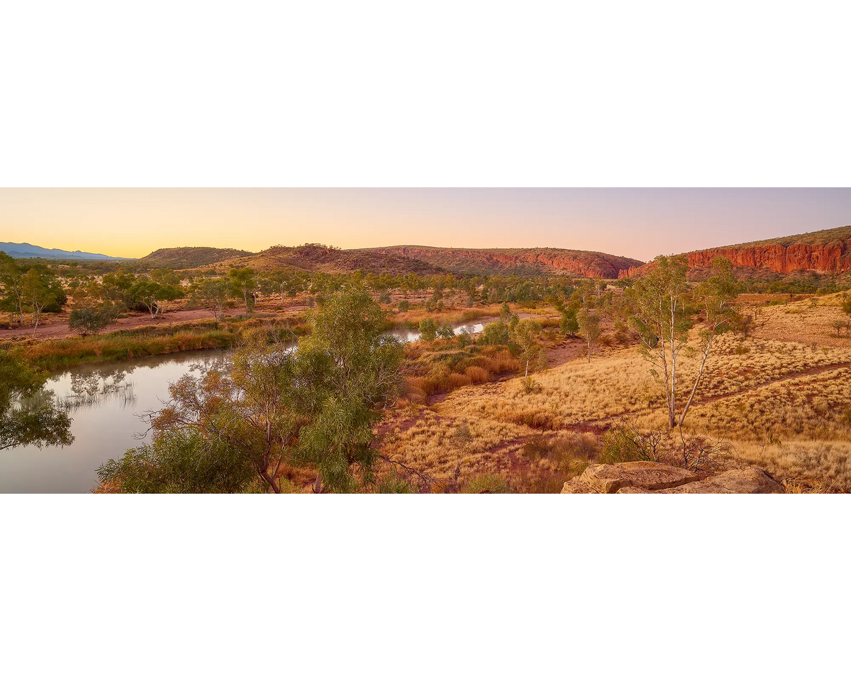 Scenic view of Finke River at sunrise.