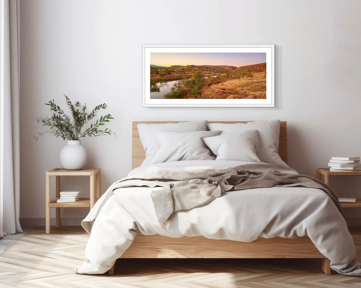The Long Continuum. White framed, outback wall art print, in a scandi-themed bedroom.
