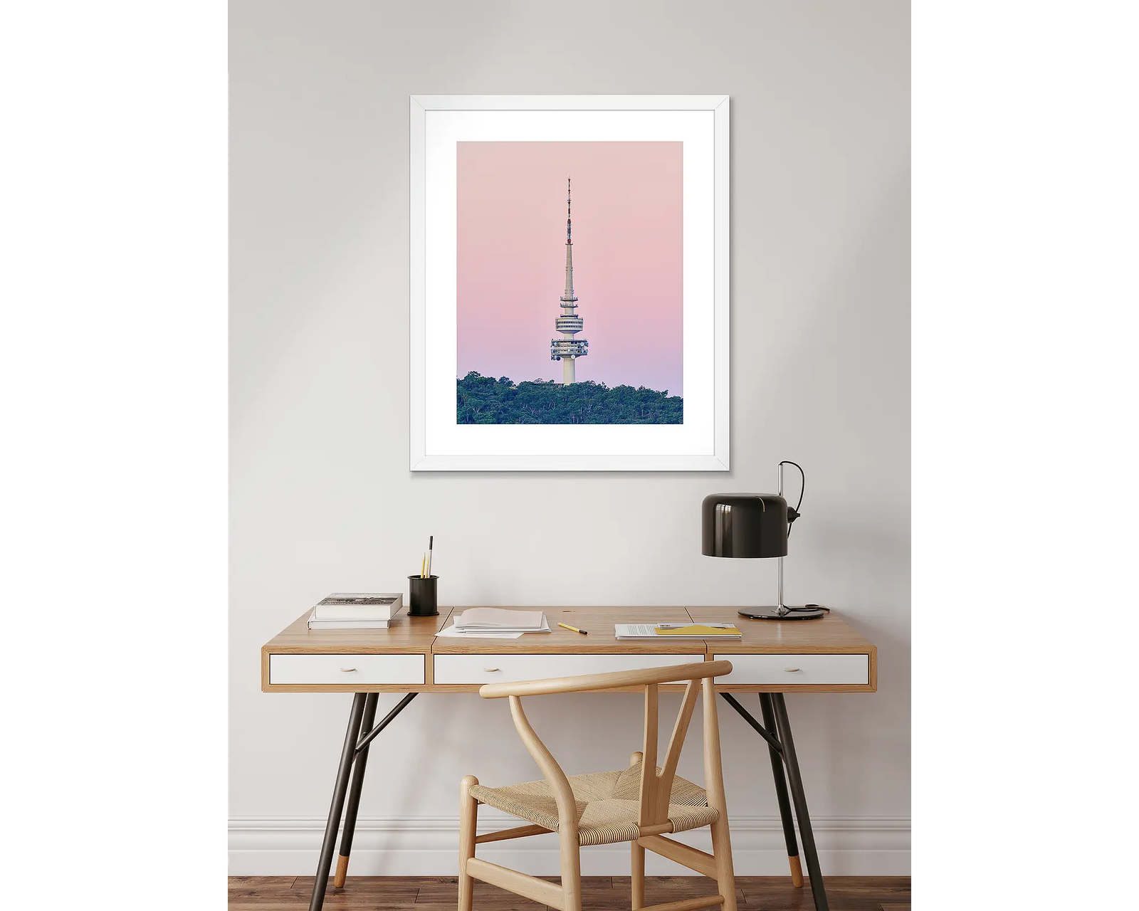 The Needle - Telstra Tower on Black Mountain with pink sunset in Canberra.