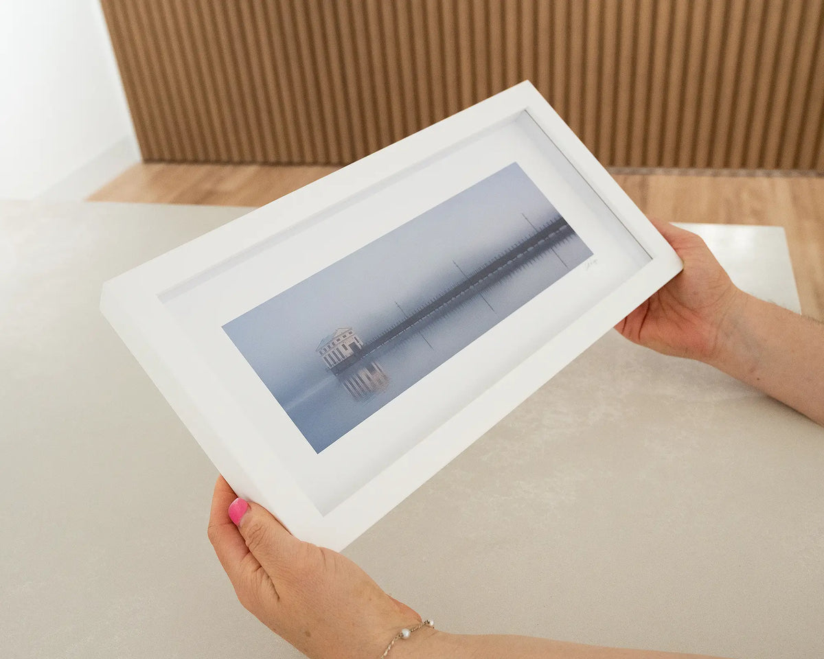 The Pumphouse. Morning fog at Pumphouse Point Tasmania, with white frame being hand held.