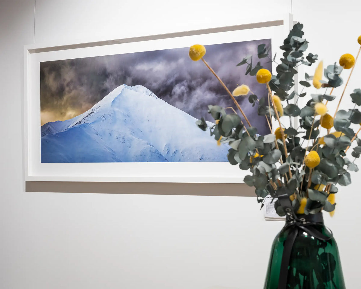 The Summit. Wall art print with white frame of Mount Fethertop, with flowers in the foreground.
