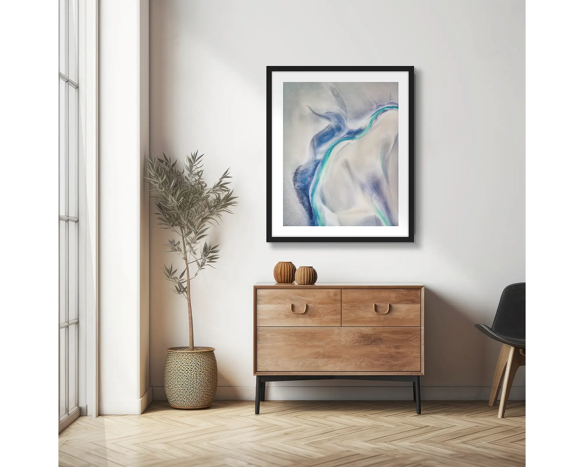 Tidal Orchid. Abstract photographic wall art print, with a black frame, hung in a scandi hallway. 