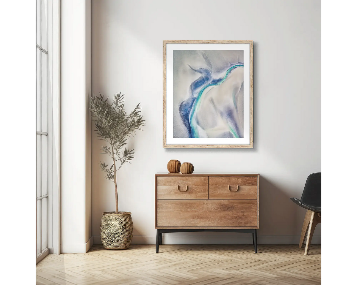 Tidal Orchid. Abstract photographic wall art print, with a Tassie Oak frame, hung in a scandi hallway. 