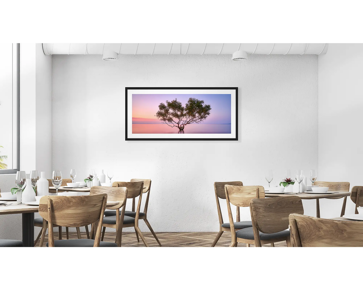 Tidal Tranquility. Fraser Island wall art print in a black frame hung in a cafe.