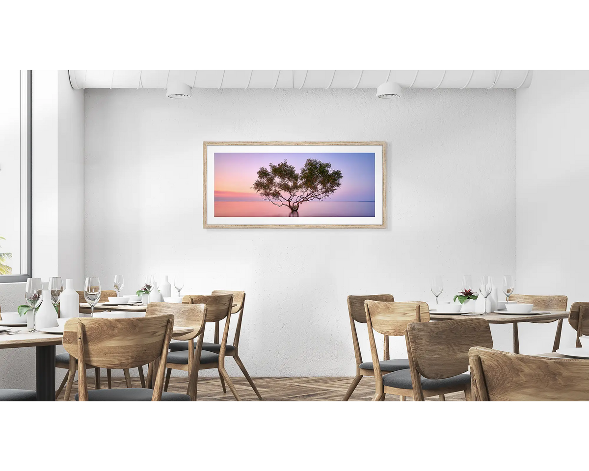 Tidal Tranquility. Fraser Island wall art print in a timber frame hung in a cafe.