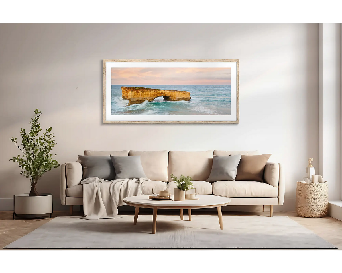 Time Out. Large wall art print of London Bridge, with a timber frame, hung above a lounge room couch. 