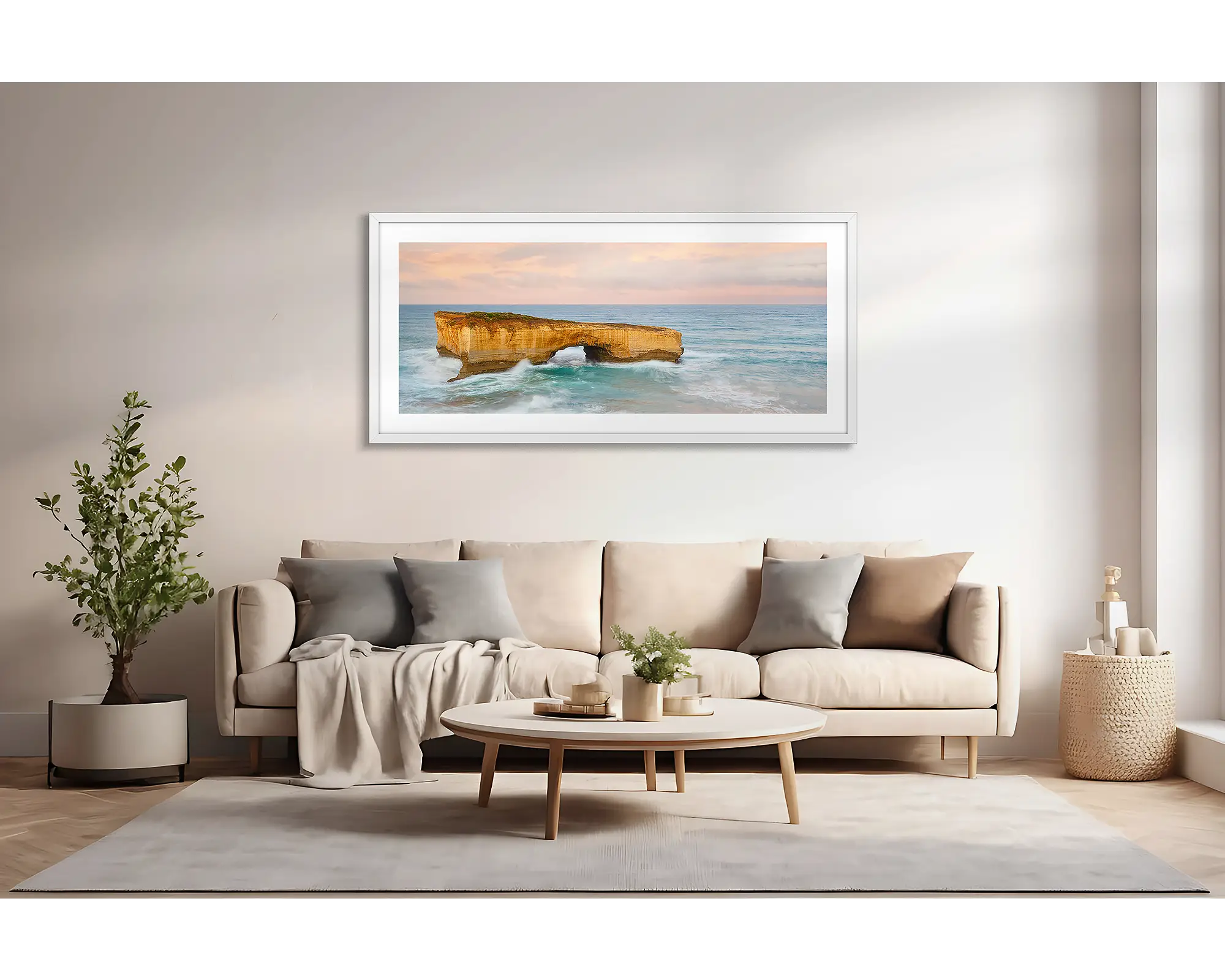 Time Out. London Bridge on the Great Ocean Road, with a pink sunrise.